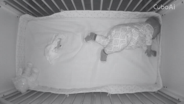 Baby sleeping in crib from the Cubo AI app