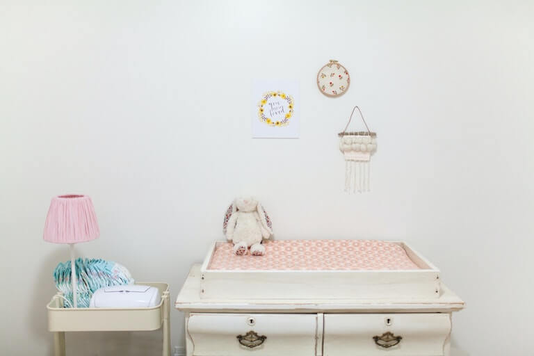 Wooden changing table in baby room