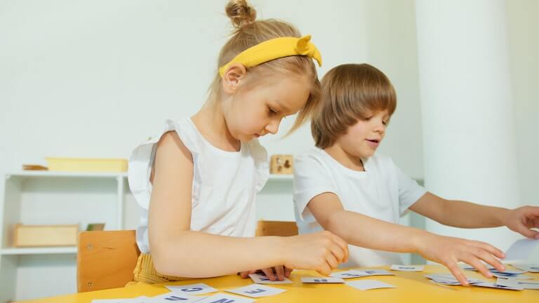 Boy and girl in school learning