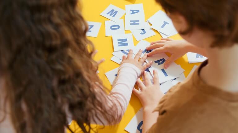 Kids learning letters in school
