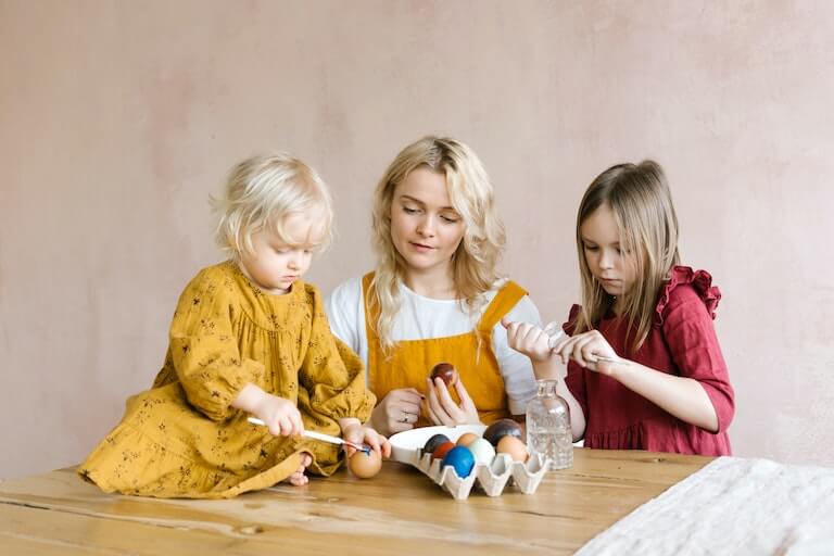 Three girls of different ages playing