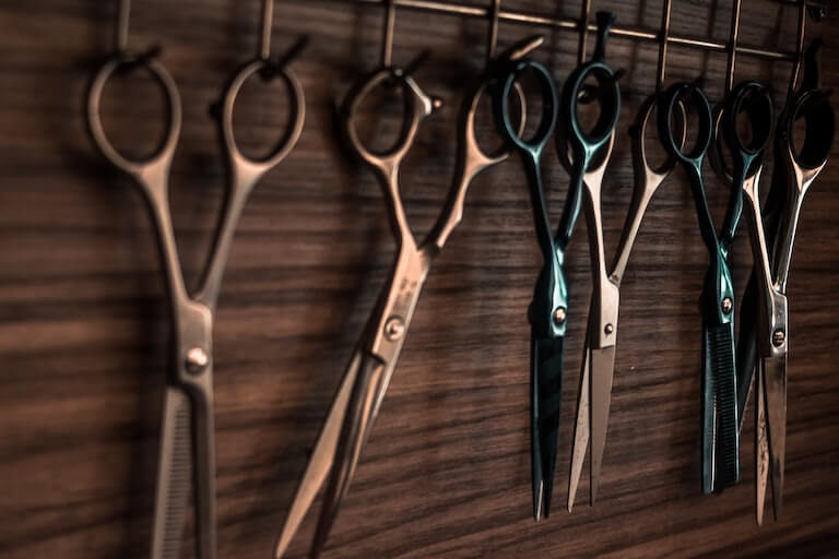 Scissors hanging on the wall