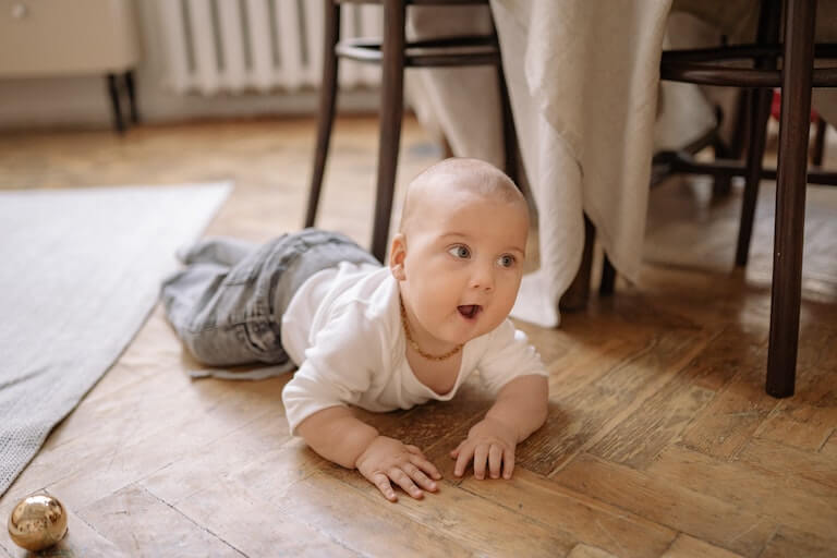Baby crawling around on the floor