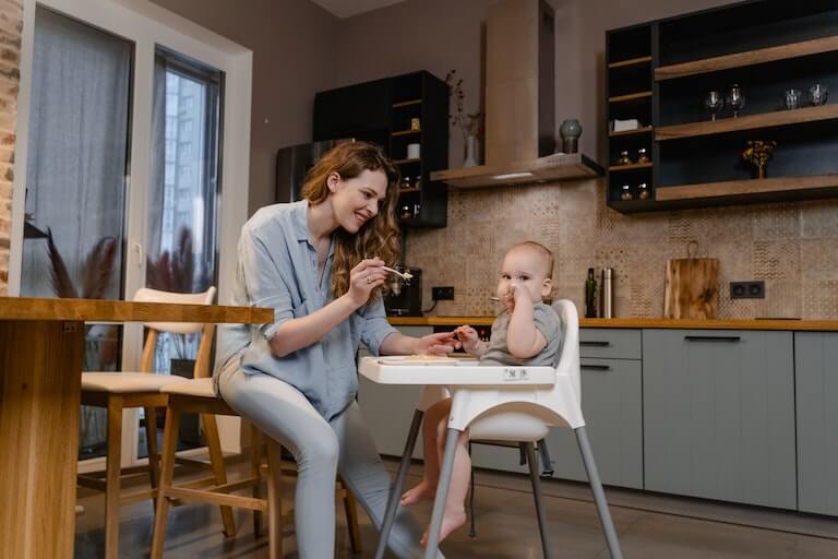 Mother feeding her baby