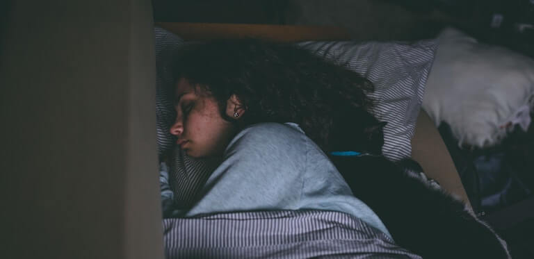 New mom finally getting sleep in bed