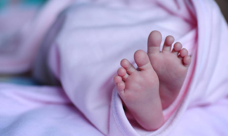 Newborn baby feet