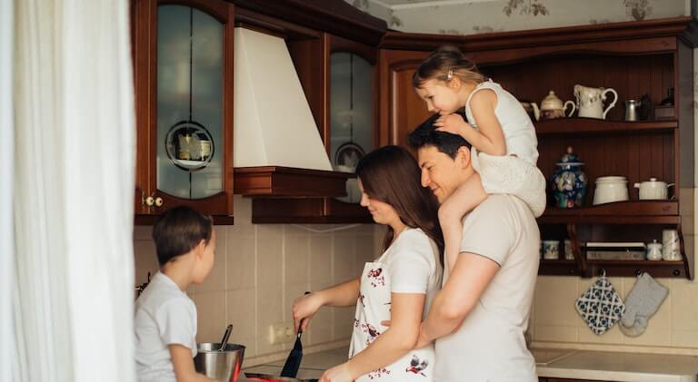Family together in the kitchen