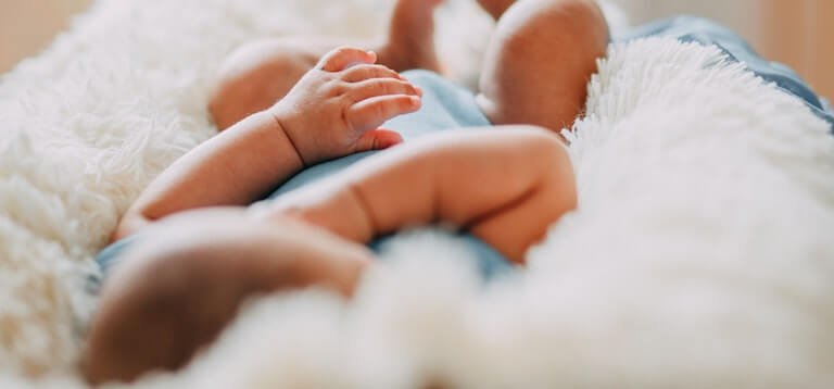 Baby sleeping on their back